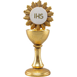 Kelch aus Holz mit Hostie