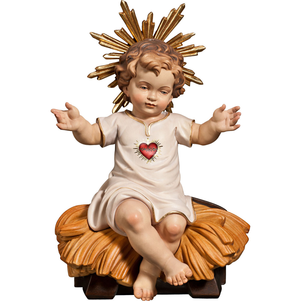 Menino Jesus vestido com Coração sentado na cama