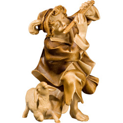 Herdsman knelling with flute and lamb