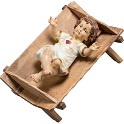 Gesù Bambino vestito con Cuore in culla semplice
