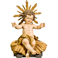 Menino Jesus sentado na cama