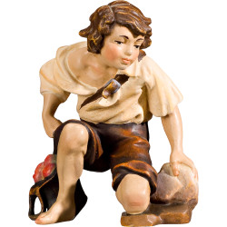 Herdsman kneeling
