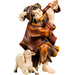 Herdsman knelling with flute and lamb