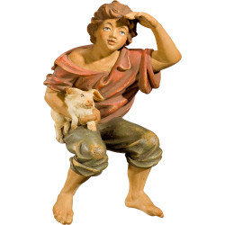 Pastor sentado com coelho