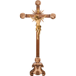 Corpus Pisa on cross with Evangelists and rays on pedestal