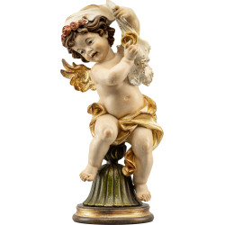 Ángel Bergland con anillos de boda sobre pedestal