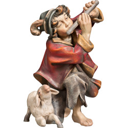 Pastore inginocchiato con flauto e agnello