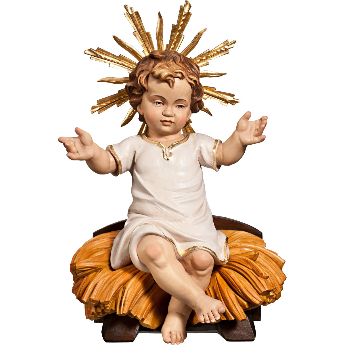 Gesù Bambino vestito seduto su culla