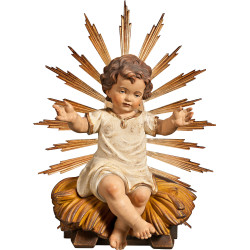 Jesus Child clothed sitting with cradle and ray-corona