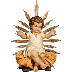 Jesus Child clothed sitting with cradle and ray-corona