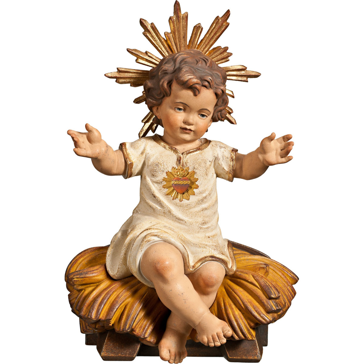 Jesuskind bekleidet mit Herz in Sitzwiege