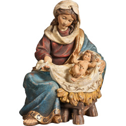 Maria seduta con Gesù Bambino