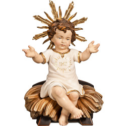 Jesus Child clothed IHS sitting with cradle