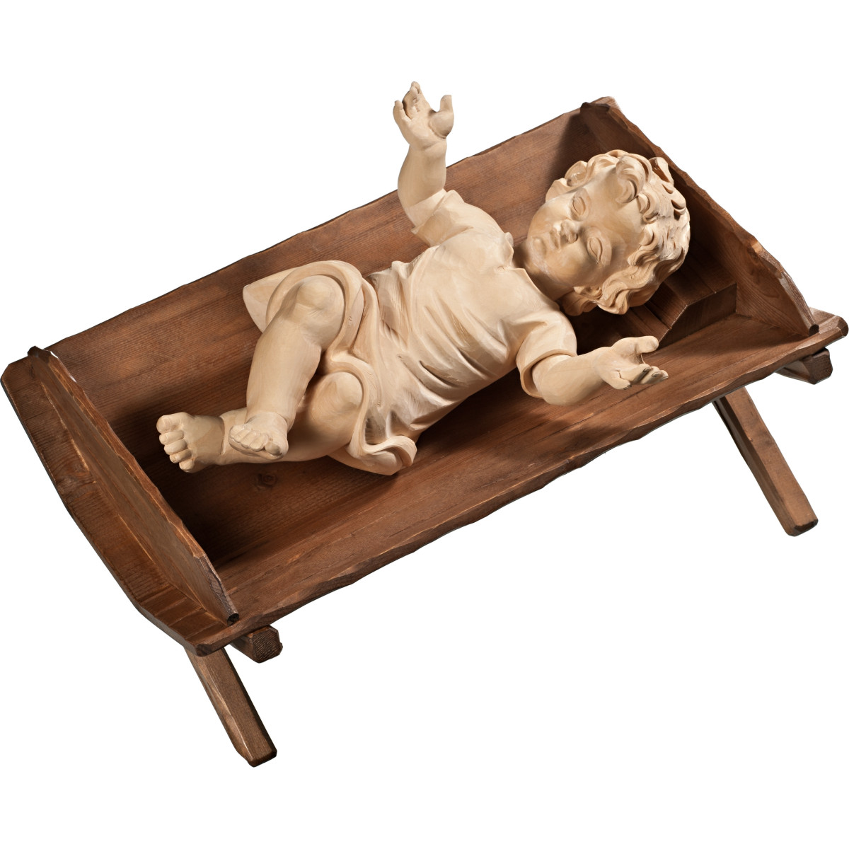 Jesuskind bekleidet in einfacher Wiege
