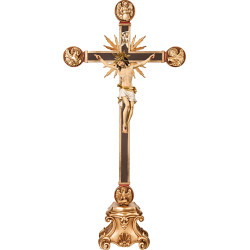 Corpus Pisa on cross with Evangelists and rays on pedestal