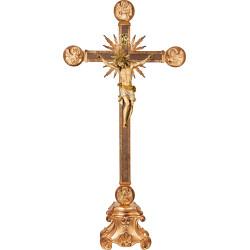 Corpus Pisa on cross with Evangelists and rays on pedestal