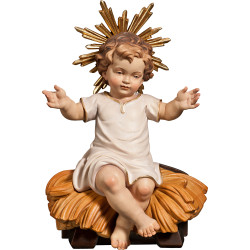 Jesus Child clothed sitting with cradle