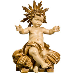 Niño Jesús sentado en cuna