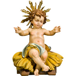 Menino Jesus sentado na cama