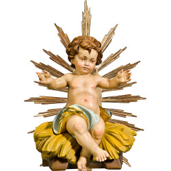 Menino Jesus sentado na cama com resplendor