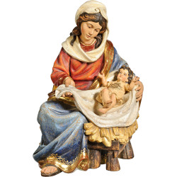 Mary sitting with Jesus Child clothed IHS