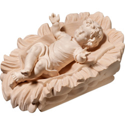 Gesù Bambino vestito in culla intagliata
