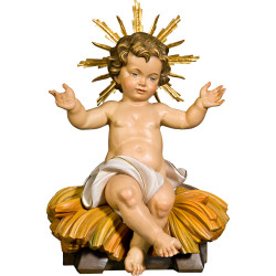Menino Jesus sentado na cama